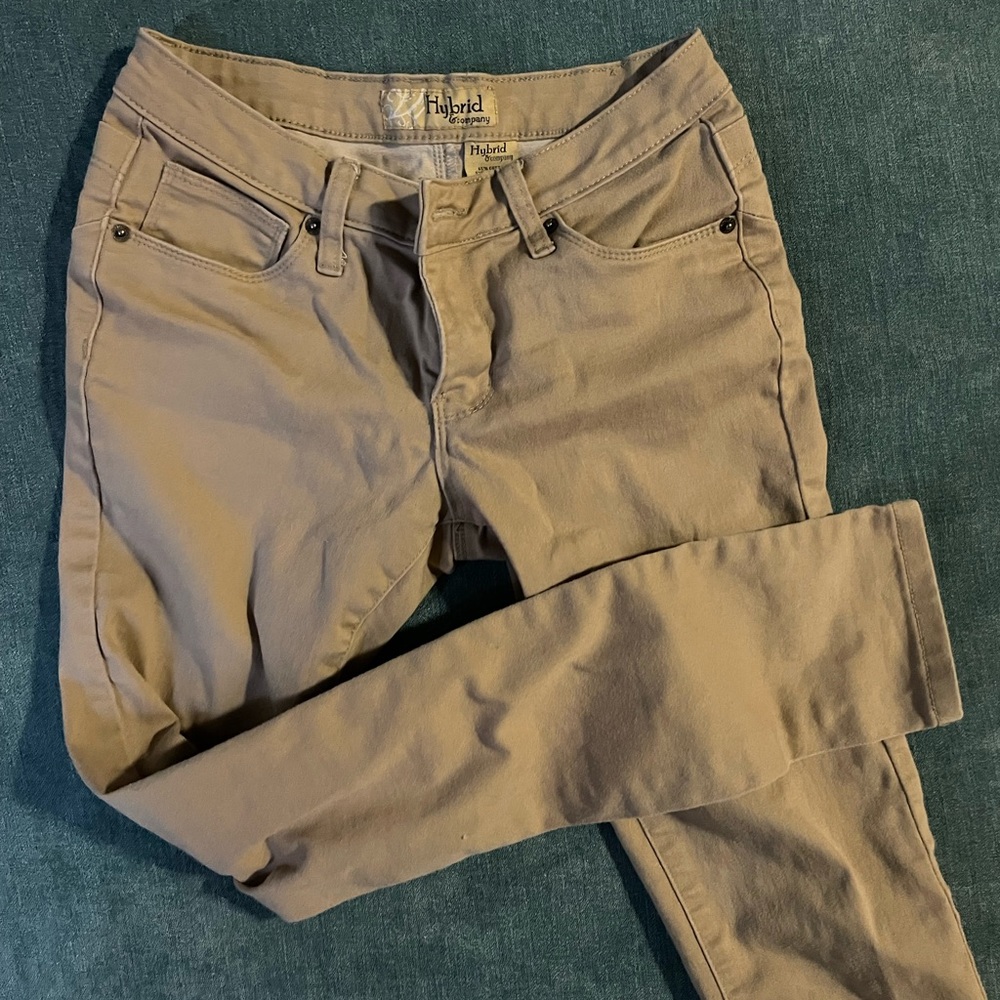 Light lower rise tan skinny pants. Used but in good shape.